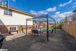 View of patio / terrace with a storage shed - 