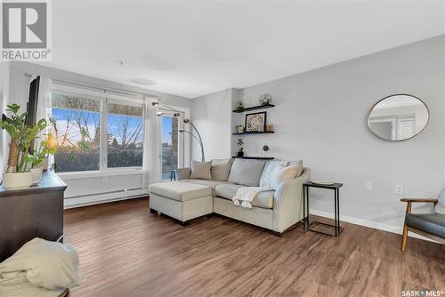 209 1622 Acadia Drive, Saskatoon, SK - Indoor Photo Showing Living Room