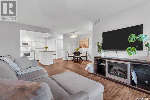 209 1622 Acadia Drive, Saskatoon, SK - Indoor Photo Showing Living Room With Fireplace