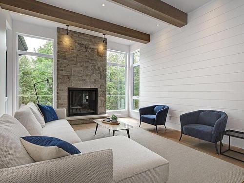 Vue d'ensemble - 1504 Ch. De L'Armoise, Piedmont, QC - Indoor Photo Showing Living Room With Fireplace