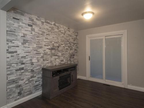 204 Briar Bay, Thunder Bay, ON - Indoor Photo Showing Other Room With Fireplace