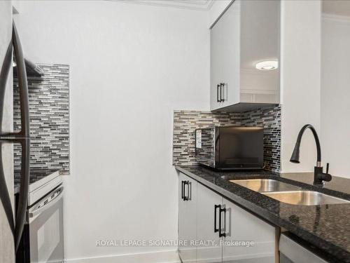 208-2391 Central Park Dr, Oakville, ON - Indoor Photo Showing Kitchen With Double Sink