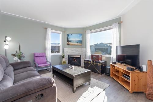 50-6400 Spencer Road, Kelowna, BC - Indoor Photo Showing Living Room With Fireplace