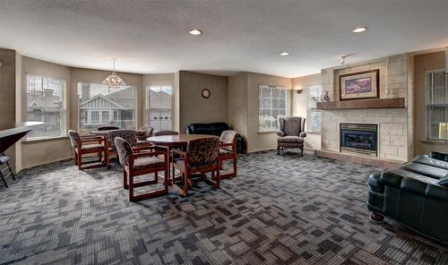 38-680 Valley Road, Kelowna, BC - Indoor Photo Showing Other Room With Fireplace