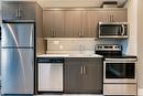 608-925 Leon Avenue, Kelowna, BC  - Indoor Photo Showing Kitchen With Double Sink 