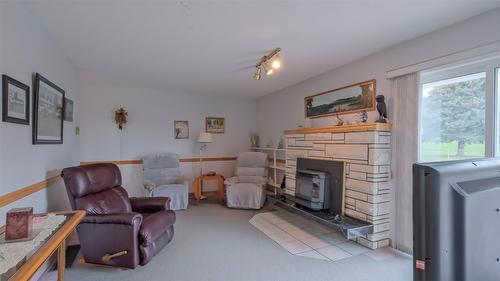 5831 Old Vernon Road, Kelowna, BC - Indoor Photo Showing Living Room With Fireplace