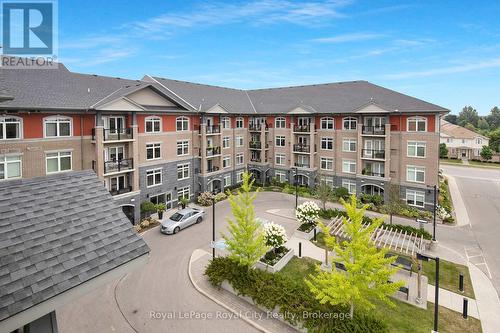 408 - 106 Bard Boulevard, Guelph (Pine Ridge), ON - Outdoor With Balcony With Facade