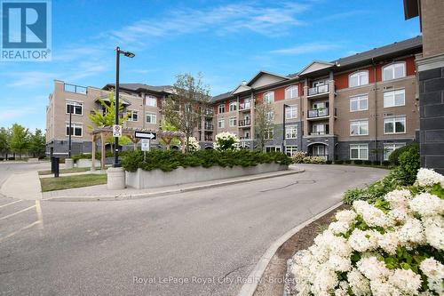 408 - 106 Bard Boulevard, Guelph (Pine Ridge), ON - Outdoor With Balcony With Facade