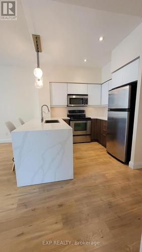 Ph9 - 509 Beecroft Road, Toronto, ON - Indoor Photo Showing Kitchen With Stainless Steel Kitchen