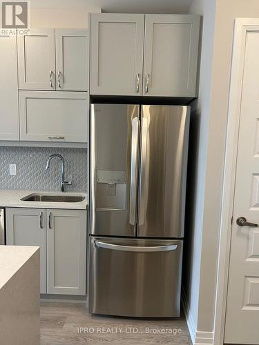 111 - 480 Gordon Krantz Avenue, Milton, ON - Indoor Photo Showing Kitchen With Stainless Steel Kitchen With Upgraded Kitchen