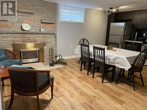 4 Knowland Drive, Toronto, ON - Indoor Photo Showing Dining Room With Fireplace