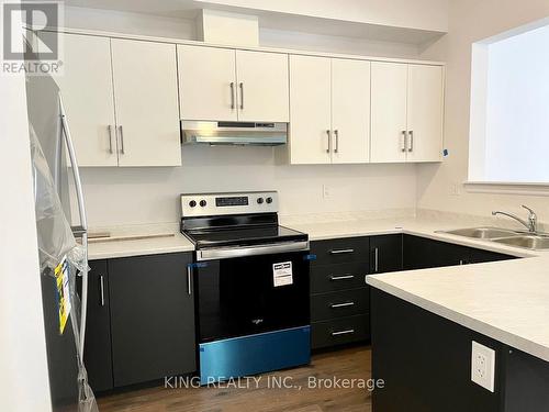 31 Elsegood Drive, Guelph, ON - Indoor Photo Showing Kitchen With Double Sink