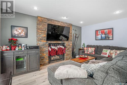 110 Maguire Court, Saskatoon, SK - Indoor Photo Showing Living Room With Fireplace