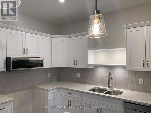 91 Keba Crescent, Tillsonburg, ON - Indoor Photo Showing Kitchen With Double Sink