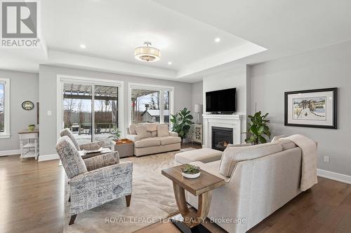 7080 Still Meadow Way, Ottawa, ON - Indoor Photo Showing Living Room With Fireplace