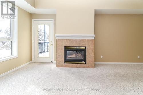 2006 - 750 Johnston Park Avenue, Collingwood, ON - Indoor Photo Showing Living Room With Fireplace