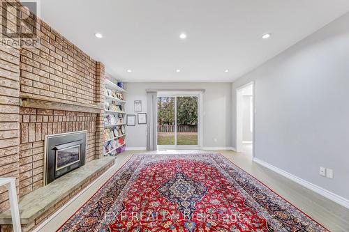 7 Winding Court, Toronto, ON - Indoor With Fireplace