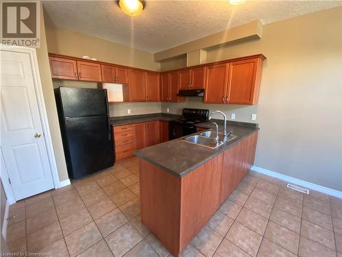 7 Booty Lane, Cambridge, ON - Indoor Photo Showing Kitchen With Double Sink