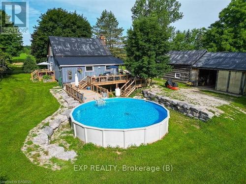 156639 Concession 7A, Chatsworth, ON - Outdoor With Above Ground Pool With Backyard