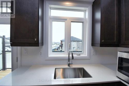 97 - 55 Tom Brown Drive, Brant, ON - Indoor Photo Showing Kitchen