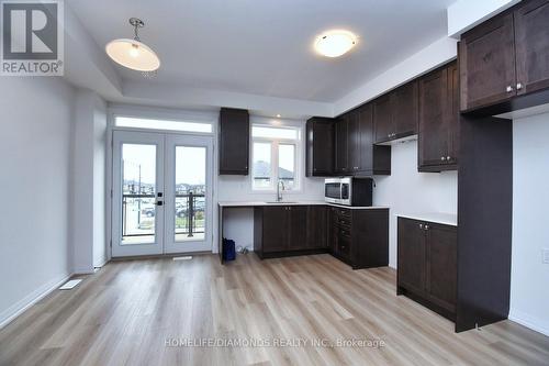 97 - 55 Tom Brown Drive, Brant, ON - Indoor Photo Showing Kitchen