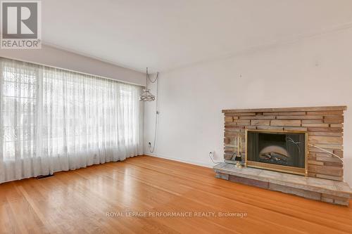 816 Dickens Avenue, Ottawa, ON - Indoor Photo Showing Living Room With Fireplace