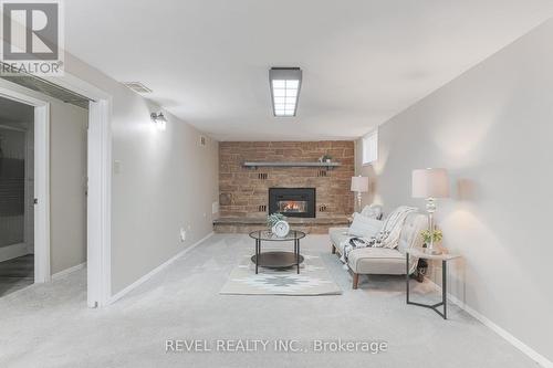 10 Hamilton Street, Kawartha Lakes (Lindsay), ON - Indoor Photo Showing Living Room With Fireplace