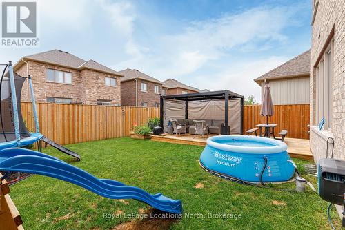 48 Mclean Avenue, Collingwood, ON - Outdoor With Above Ground Pool With Backyard