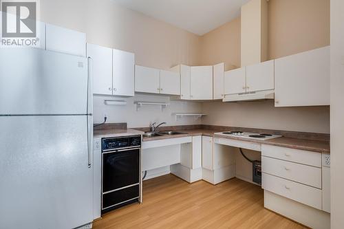 switches, plug-ins, etc. for convenience - 920 Saskatoon Road Unit# 119, Kelowna, BC - Indoor Photo Showing Kitchen With Double Sink