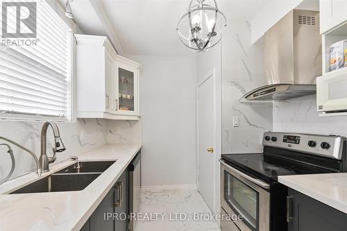 135 Downsview Avenue, Toronto, ON - Indoor Photo Showing Kitchen With Double Sink