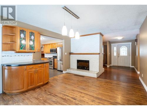 Kitchen Fireplace - 1557 Nichol Road, Revelstoke, BC - Indoor With Fireplace