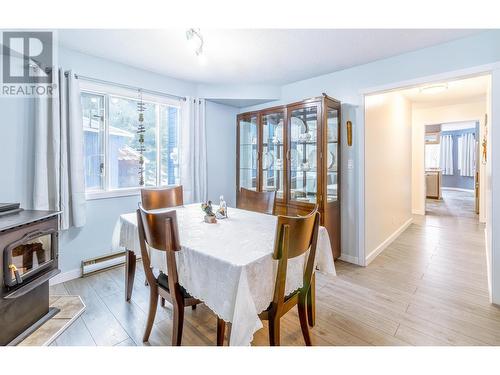 4315 Rainbow Drive, Canim Lake, BC - Indoor Photo Showing Dining Room With Fireplace