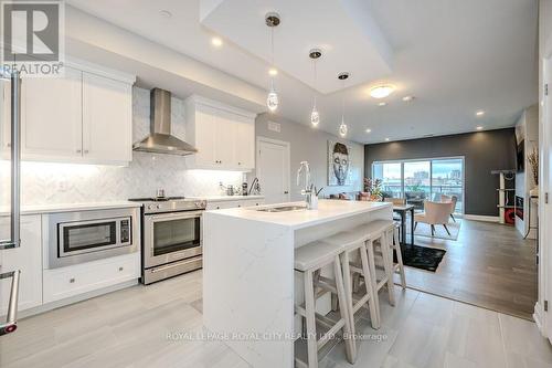 608 - 71 Wyndham Street S, Guelph, ON - Indoor Photo Showing Kitchen With Upgraded Kitchen