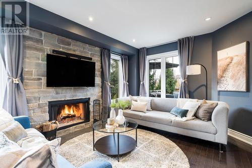 21 Robertson Street, Collingwood, ON - Indoor Photo Showing Living Room With Fireplace