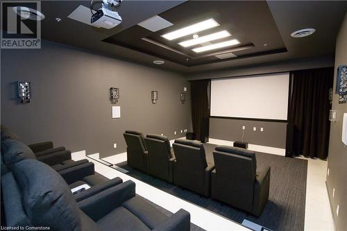 Home theater room with a raised ceiling - 112 King Street E Unit# 305, Hamilton, ON - Indoor