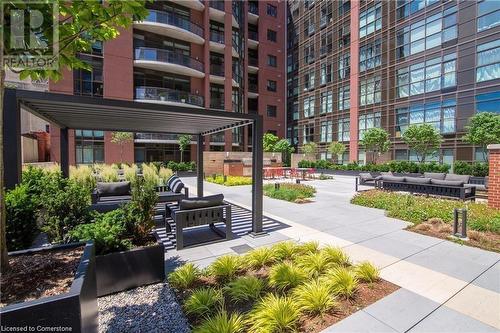 Surrounding community featuring a pergola - 112 King Street E Unit# 305, Hamilton, ON - Outdoor With Facade