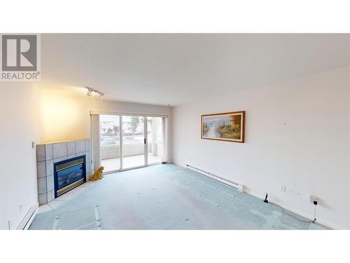 1700 2Nd Street N Unit# 115, Cranbrook, BC - Indoor With Fireplace