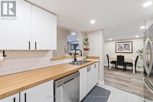 63 - 2530 Northampton Boulevard, Burlington, ON - Indoor Photo Showing Kitchen With Double Sink