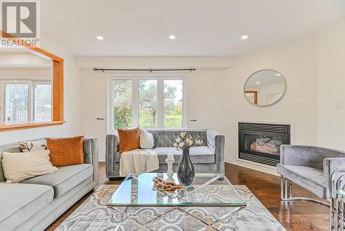 40 Eric Clarke Drive, Whitby, ON - Indoor Photo Showing Living Room With Fireplace