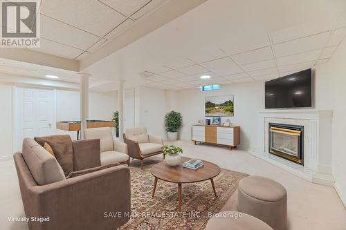 40 Eric Clarke Drive, Whitby, ON - Indoor Photo Showing Living Room With Fireplace