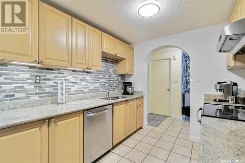 28 2707 7Th Street E, Saskatoon, SK - Indoor Photo Showing Kitchen With Double Sink