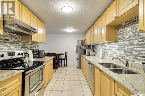 28 2707 7Th Street E, Saskatoon, SK - Indoor Photo Showing Kitchen With Double Sink