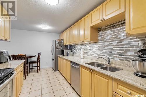 28 2707 7Th Street E, Saskatoon, SK - Indoor Photo Showing Kitchen With Double Sink