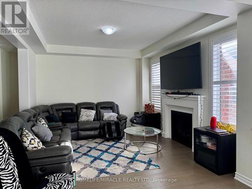 Upper - 16 Speckled Alder Street, Caledon, ON - Indoor Photo Showing Living Room With Fireplace