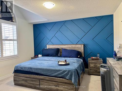 Upper - 16 Speckled Alder Street, Caledon, ON - Indoor Photo Showing Bedroom