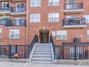 305 - 35 Strangford Lane, Toronto, ON  - Outdoor With Balcony With Facade 