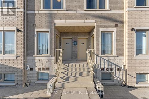 338 - 100 Honeycrisp Crescent, Vaughan, ON - Outdoor With Facade