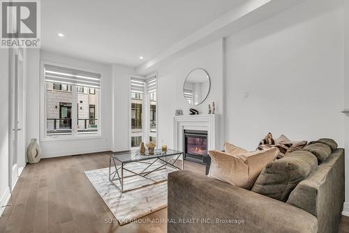 34 Globemaster Lane S, Richmond Hill, ON - Indoor Photo Showing Living Room With Fireplace