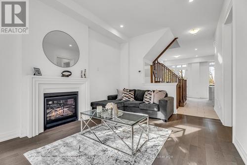 34 Globemaster Lane S, Richmond Hill, ON - Indoor Photo Showing Living Room With Fireplace