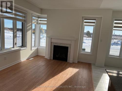 2 Prudhoe Terrace, Barrie, ON - Indoor Photo Showing Living Room With Fireplace